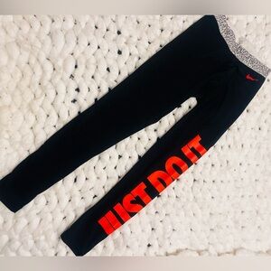 Nike Women’s Black Leggings with Bright Orange 'JUST DO IT' Side Logo